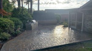 wood grain stamped concrete patio installed by Superb Concepts