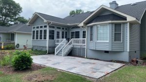 wood grain stamped concrete patio installed by Superb Concepts